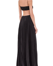 Black pleated gown on a white background